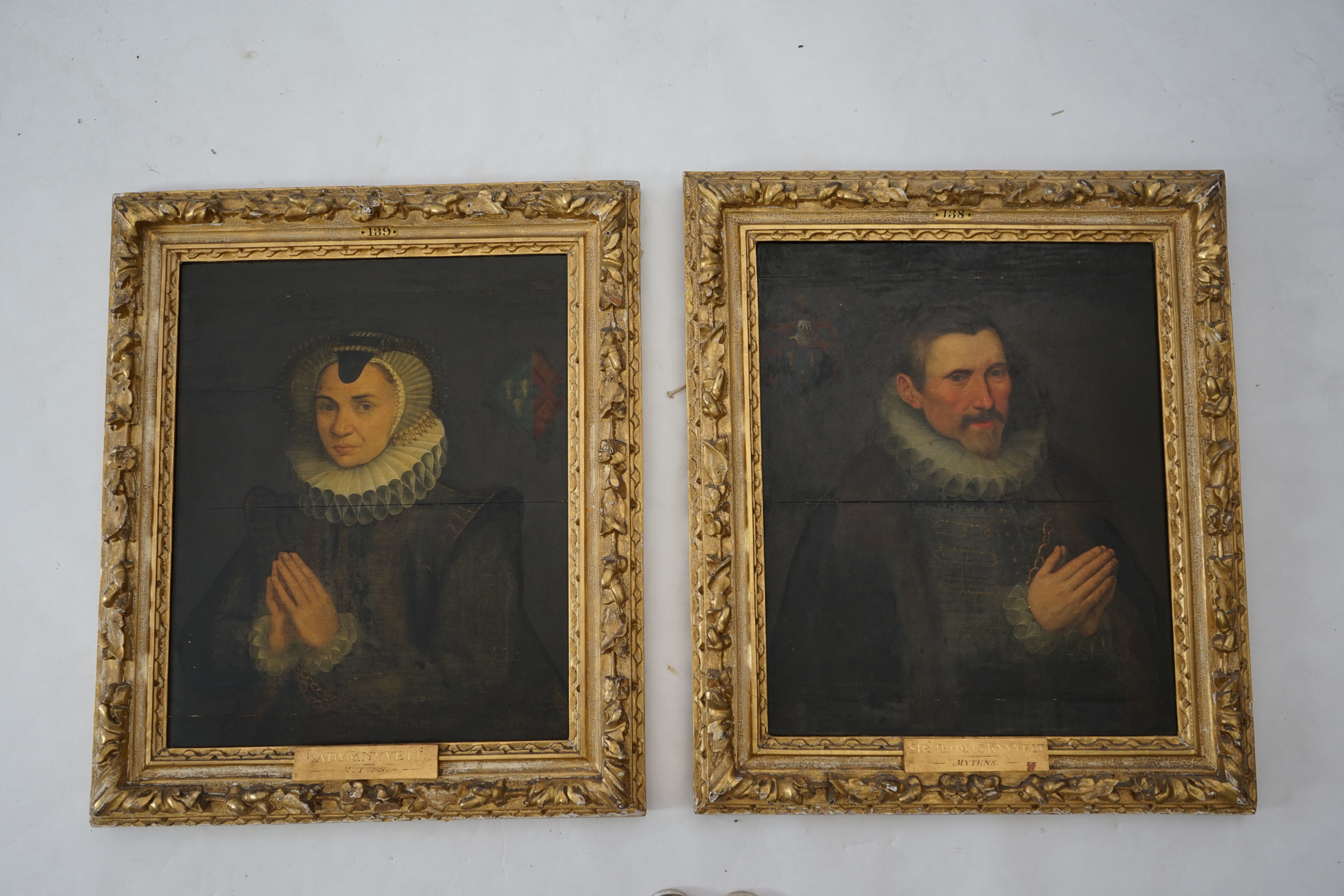 Anglo Dutch School, 17th century, after Daniel Mytens (1590-1647), Half length portraits of Sir Thomas Kynvet (c.1539-1617) and his wife, Muriel Parry, Lady Kynvet, oils on board, a pair, 63 x 51cm